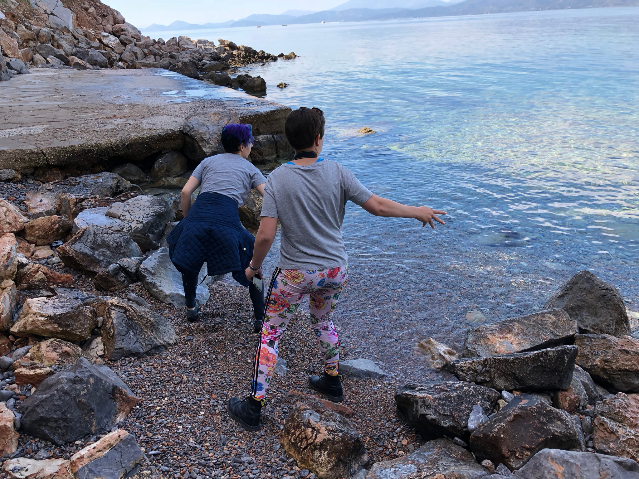 We “hiked” (really a couple hundred stony stair steps) down to this “beach” (really five feet of pebbles). The girls skipped rocks.