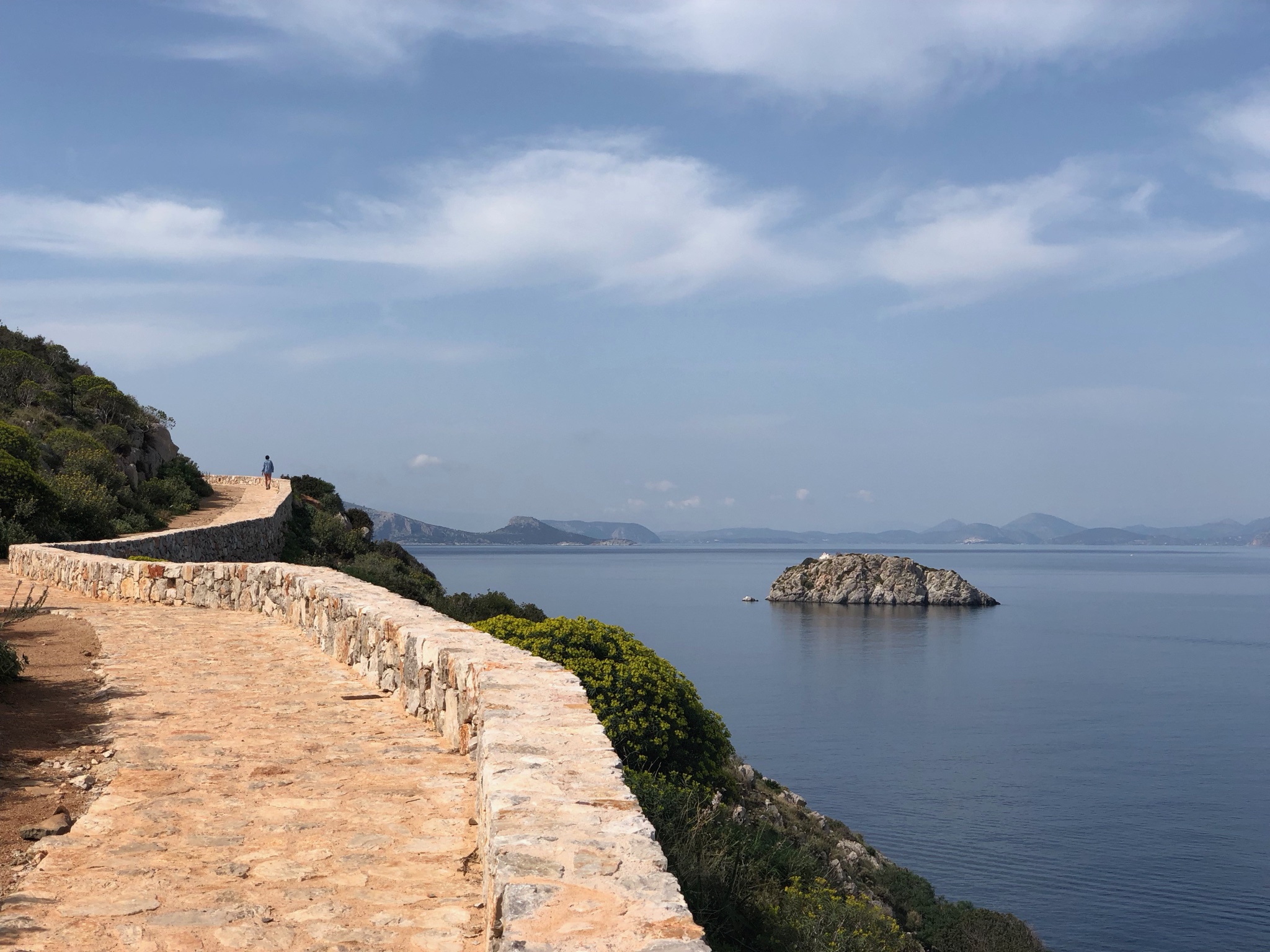 Then we walked a couple of miles along the waterline streets to a beach. That’s Sophie way up there impatient to get to the beach.