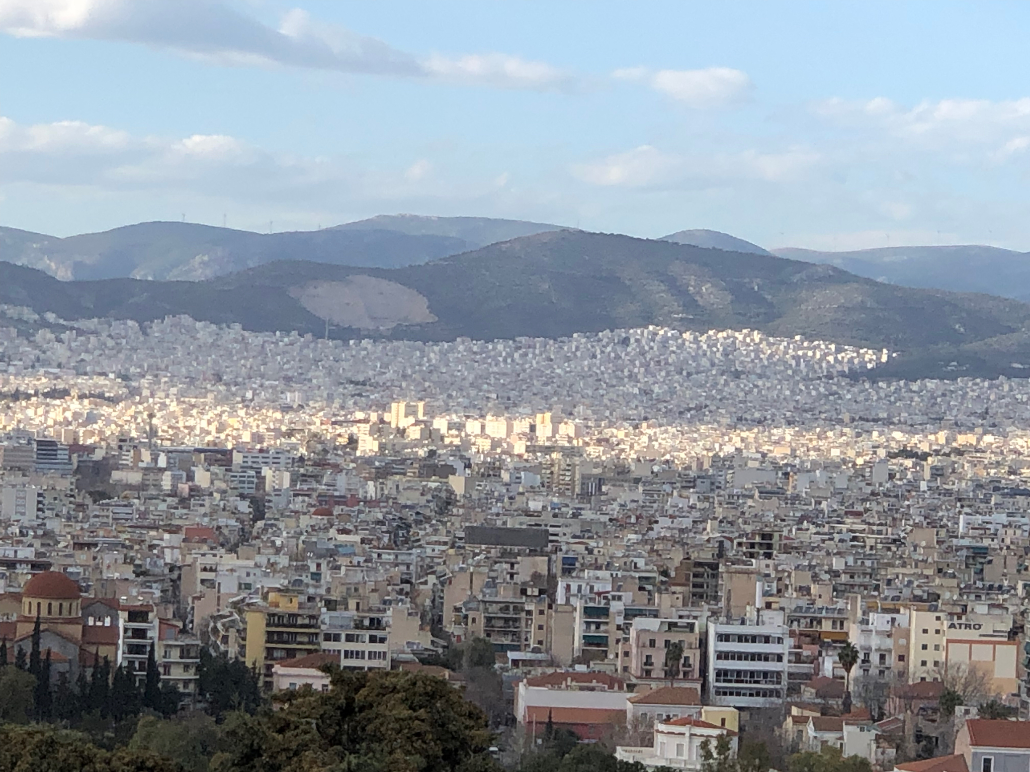 One tiny slice of the beautiful mess of Athens seen from Mars Hill. I believe that patch on the mountain side is a Pentelic marble quarry. You can see several of them in the mountains all around if you look closely. Sometimes it seems like with all the massive structures around made of solid marble that Athens would run out. Then you see these and you realize there’s a lot of rock in those mountains. Thousands of years of quarries just look like little spots here and there.