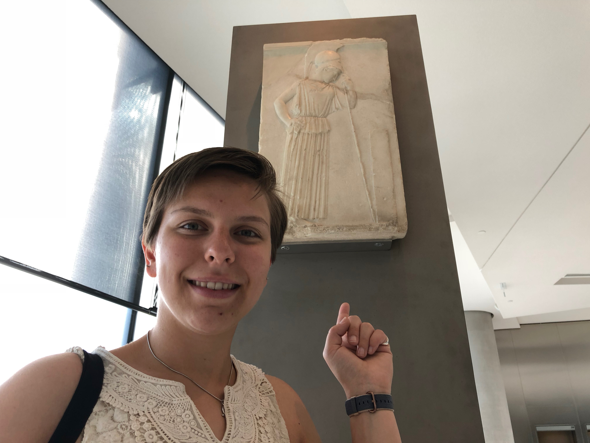 Isabel with The Pensive Athena, one of her favorite pieces in the museum and a very famous image.