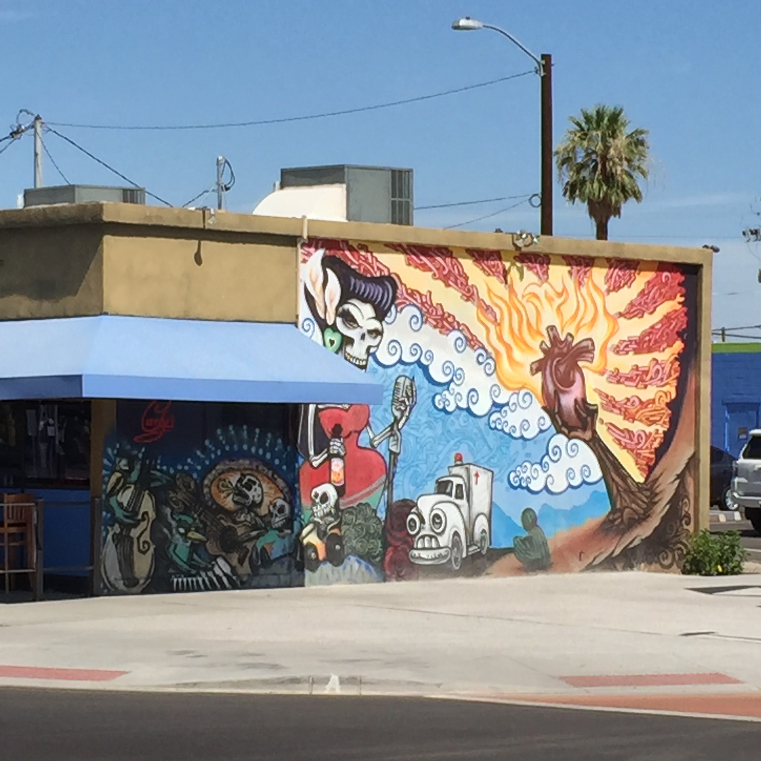 A flaming human heart forms something of an Arizona flag somewhere in the Arts district.