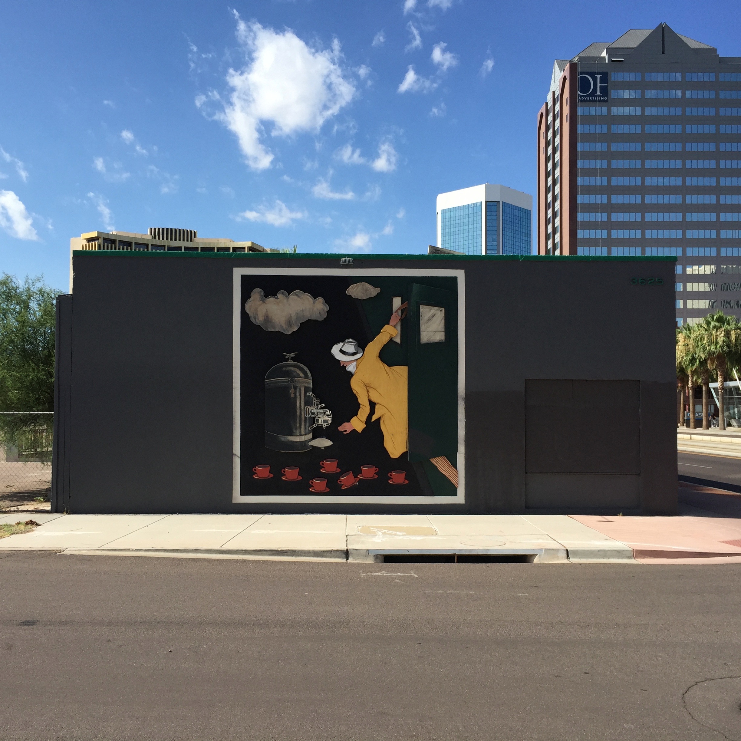 I always liked this dimensional cut and painted plywood piece on the side of the old abandoned rental office for the defunct Cielo highrise apartment project.