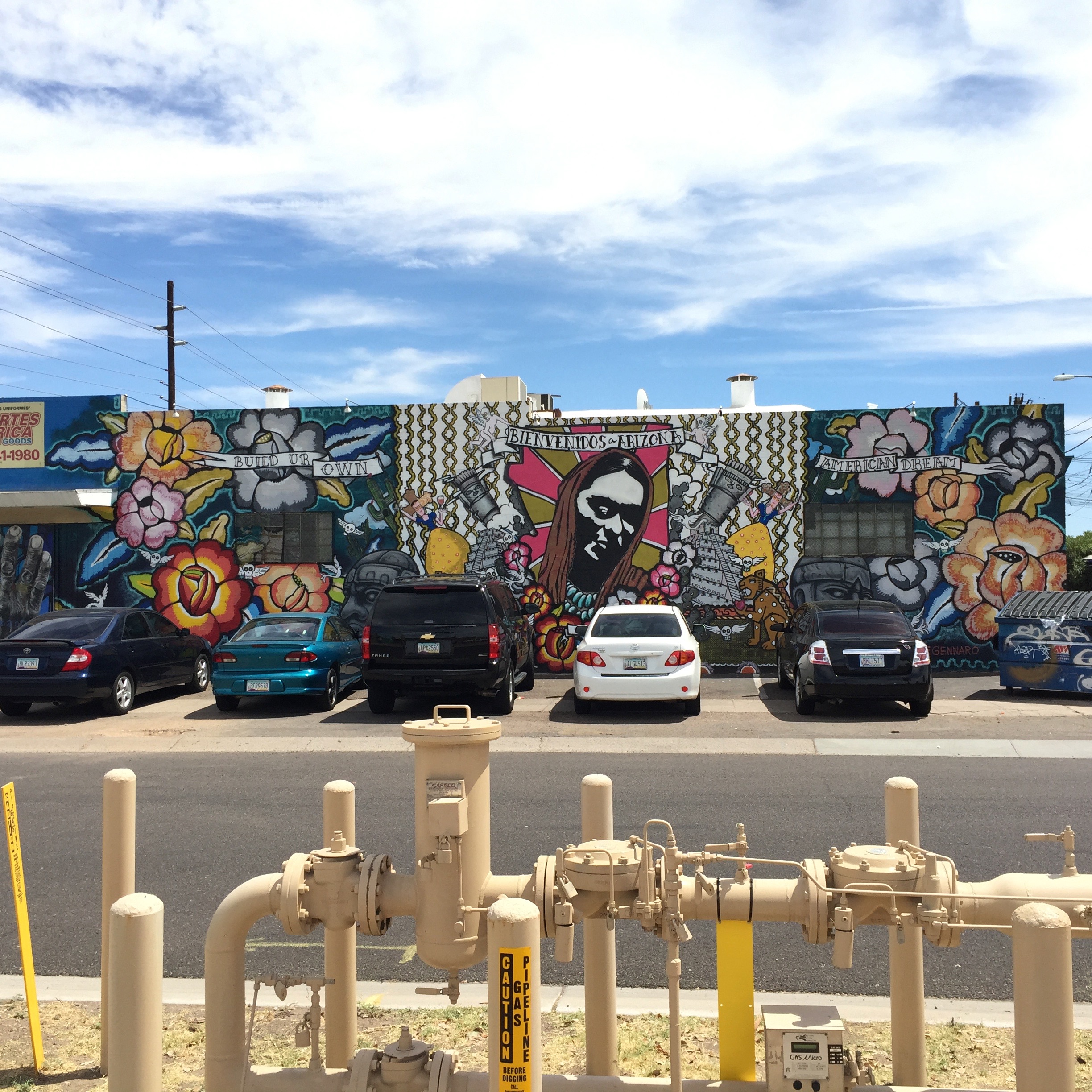 The famous large collaborative mural on the north side of Barrio Cafe.