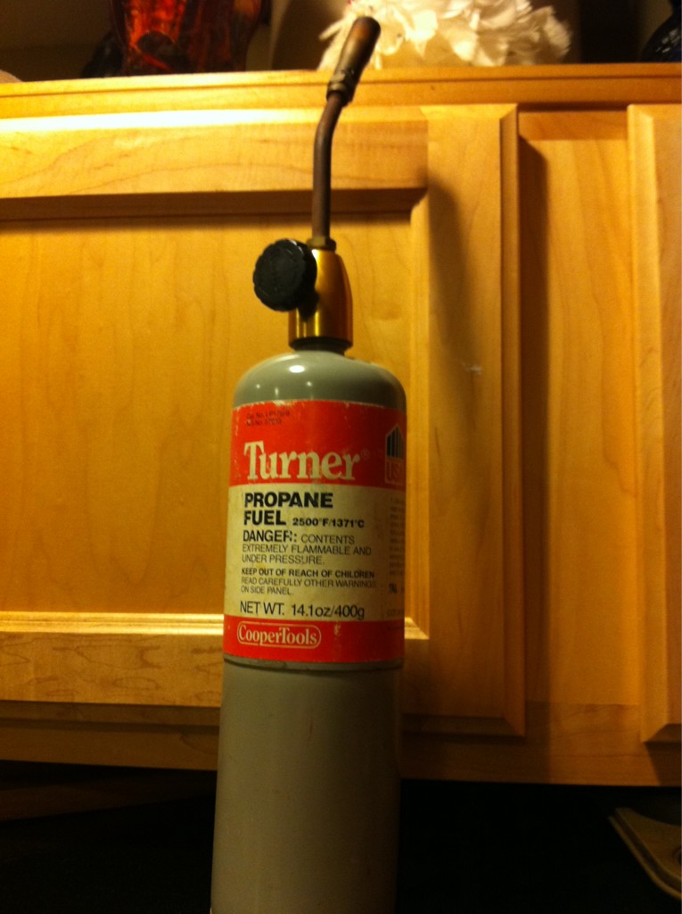 A standard small propane fuel bottle with torch attachment. This one is "Turner" brand.