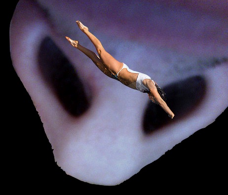 A poorly done digital collage showing a diver paster over a giant human nose so the diver (sort of) appears to be diving into one of the nostrils.